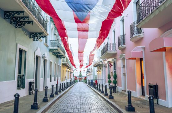 Flag of Puerto Rico hanging over the street in Old San Juan