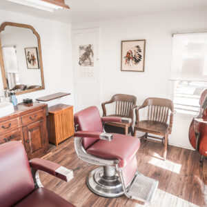 Two vintage Belmont barber chairs sit inside Electric Barbering in Williams, Arizona.