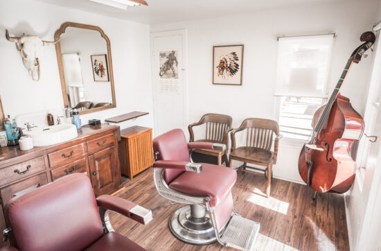 Two vintage Belmont barber chairs sit inside Electric Barbering in Williams, Arizona.